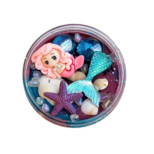 Sensorydough-speellab-zeemeermin-sensoryfun Pot sensorydough zeemeermin van bovenaf met beeld op speelfiguren